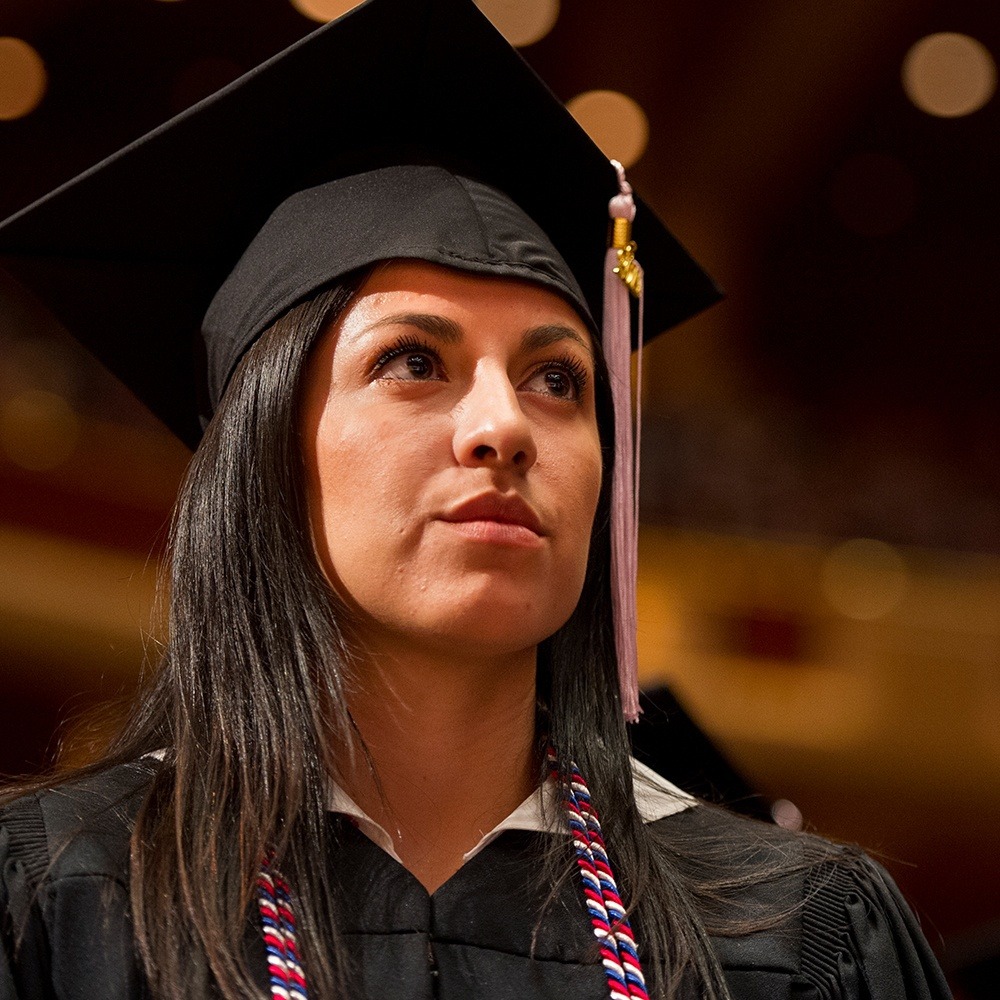 Graduate with Cap and Gown