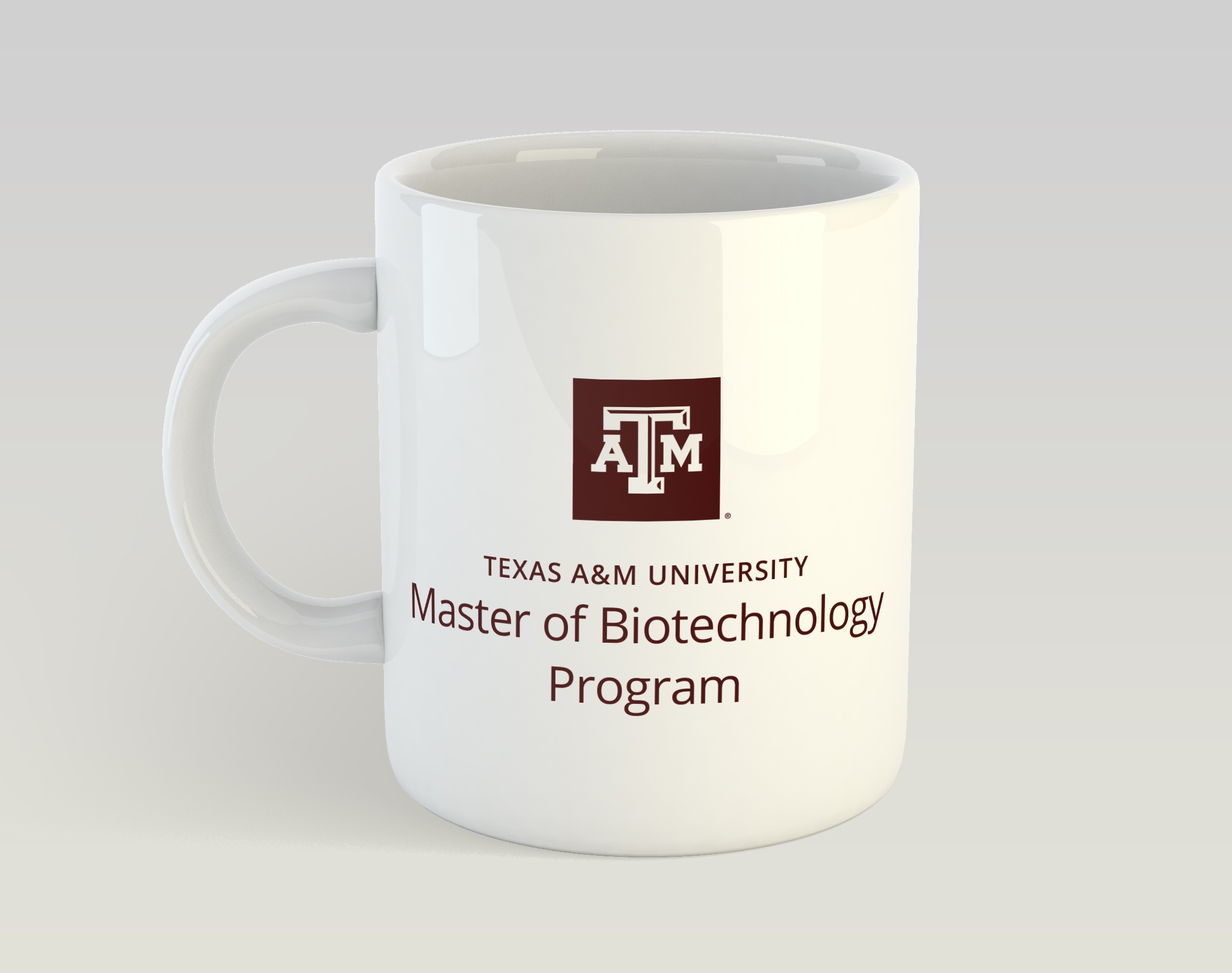 A single-color, stacked maroon lockup for the Master of Biotechnology Program displayed on a solid white mug